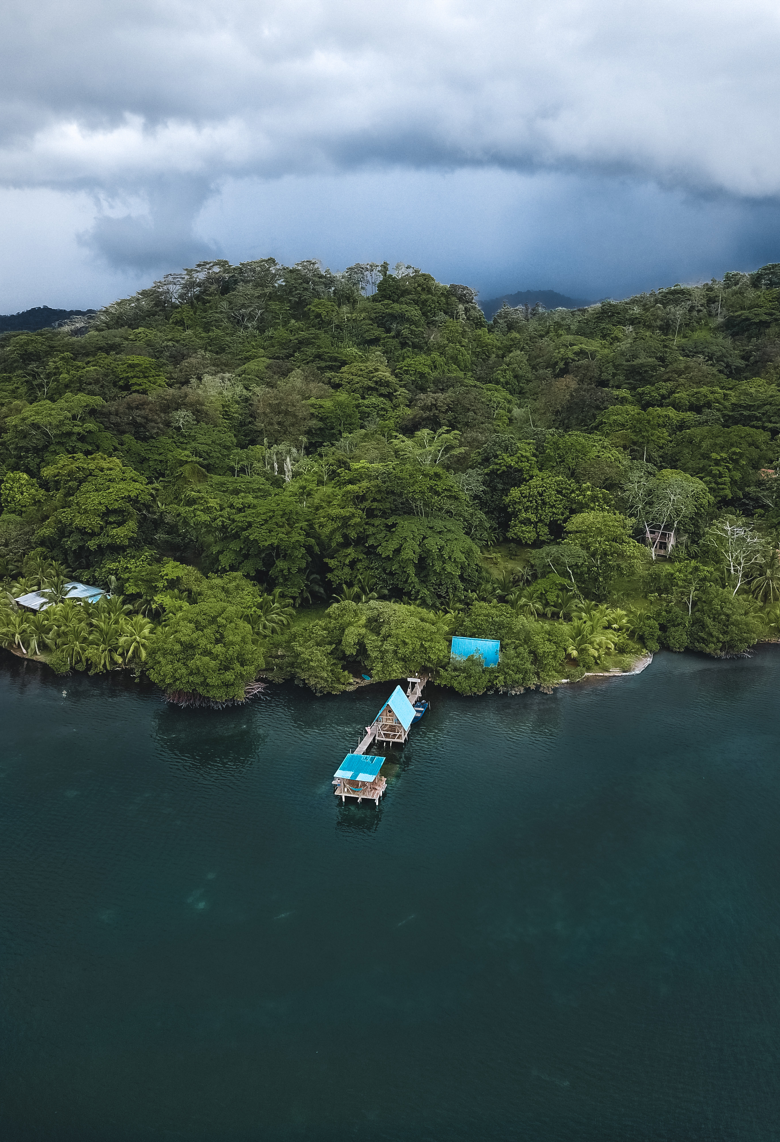 Drone shot of Finca Montezuma in Dolphin Bay with jungle views.